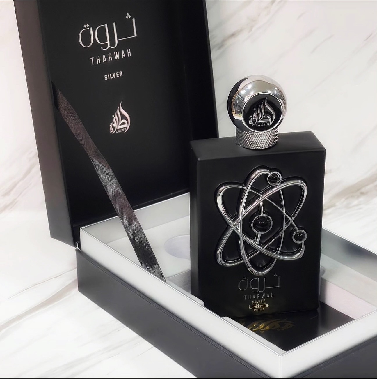 Lattafa Tharwah Silver EDP 100 мл – Дървесен аромат с лавандула - Image 7