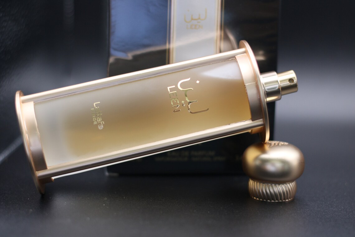 Lattafa Pride Leen EDP 100 мл – Дървесен аромат с манго - Image 13